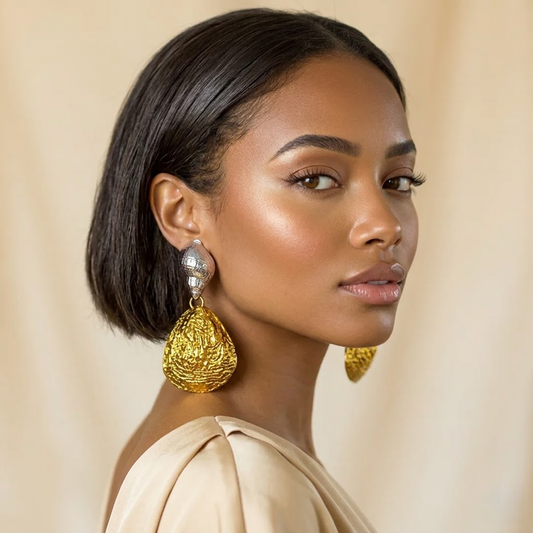 Shell Earrings — silver + gold organic shell drop earrings on model, statement shell handmade jewelry for party