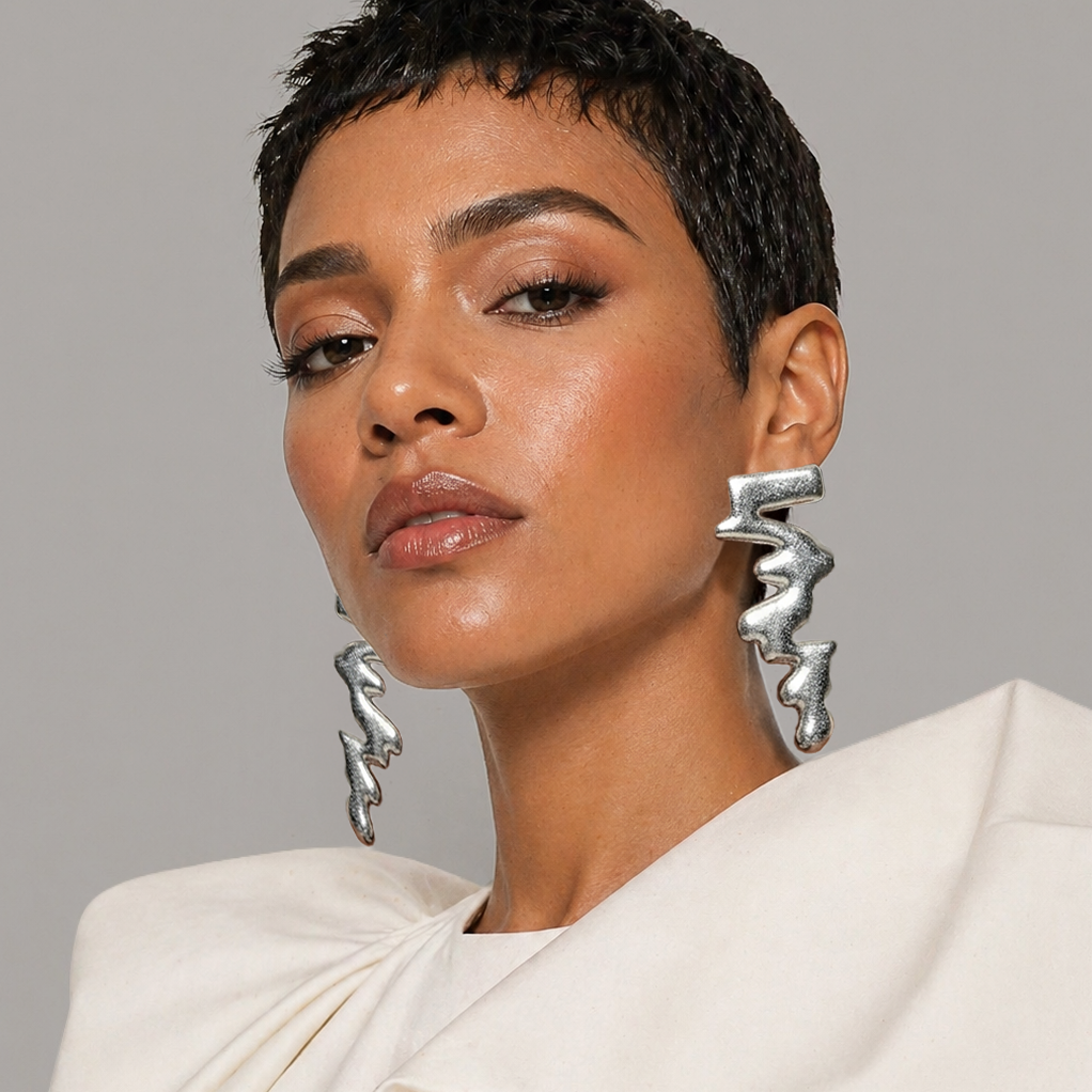 Zigzag Rhapsody Earrings — silver angular zigzag drop earrings on model, statement geometric handmade jewelry for party